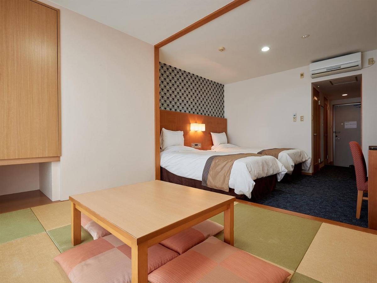 Hotel Murasakimura Йомітан Екстер'єр фото