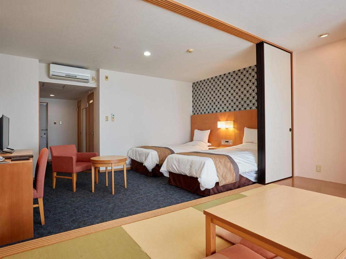 Hotel Murasakimura Йомітан Екстер'єр фото